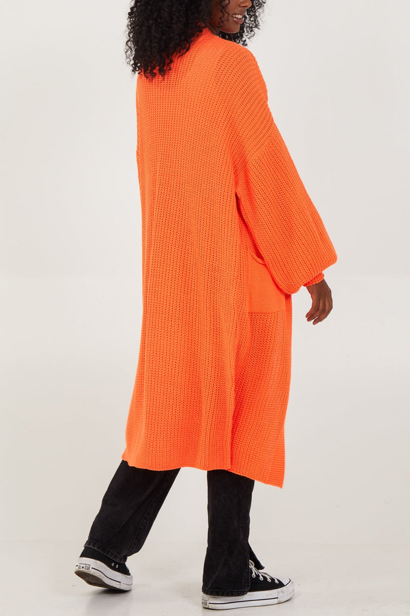 Edge to edge long knitted cardi orange